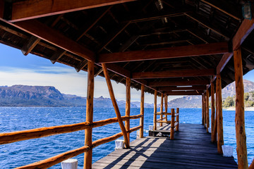 Scene view of wooden pier at Traful Lake in Villa Traful, Patagonia, Argentina