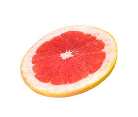 Slice of fresh grapefruit on white background
