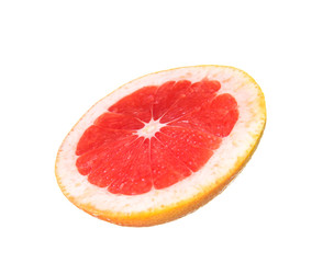 Slice of fresh grapefruit on white background