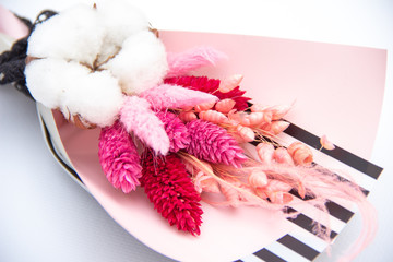 Beautiful colorful bouquet on white background. Women's Day background. Space for your text and congratulations.