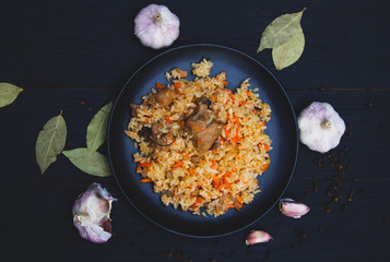 Traditional Uzbekistan pilaf with garlic and spices.
