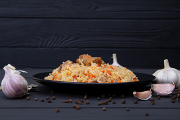Traditional Uzbekistan pilaf with garlic and spices.