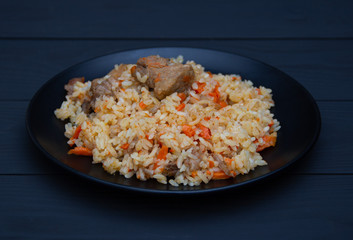 Traditional Uzbekistan pilaf with garlic and spices.