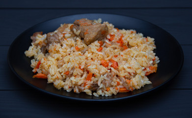 Traditional Uzbekistan pilaf with garlic and spices.