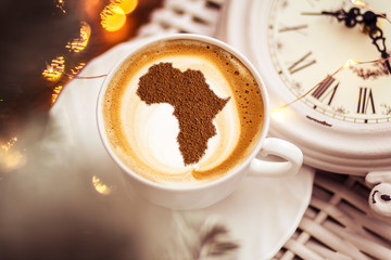 Cup of cappuccino with a picture of Africa