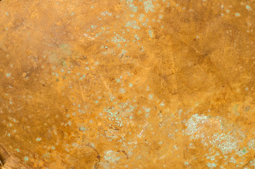 Old copper sheet surface texture with patina spots of oxidation