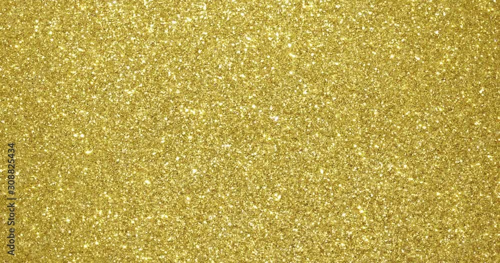 Poster gold glitter background with sparkling texture. golden shimmering of stars sequins