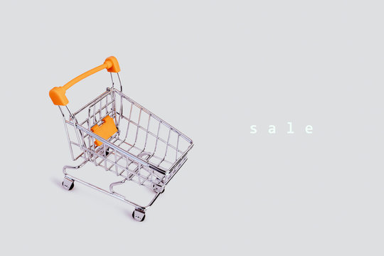 Banner with shopping cart and text. Grocery shopping and sale concept. Black friday, online shopping and store concept. Sale discount. Business background with copyspace. Stock photography.