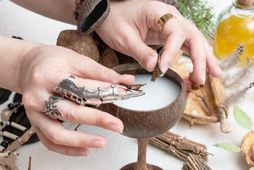 Witch doctor preparing a magic potion concept. Witchcraft.