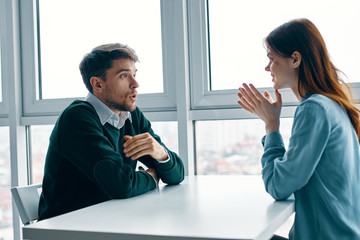 business man and woman shaking hands