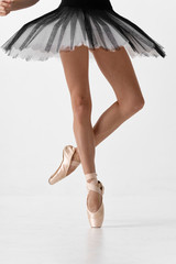 ballerina in a blue dress on white background