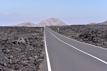 Road through volcanic lava, Timanfaya National Park, Lanzarote, Canary Islands, Spain