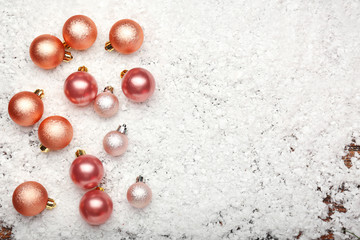 Beautiful Christmas balls with snow, top view