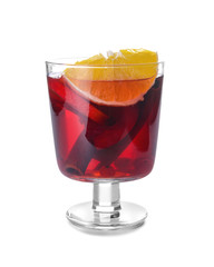 Glass of tasty mulled wine on white background