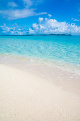 Main island, white long beach and blue ocean, tropical resort, Kayangel state, Palau, Pacific