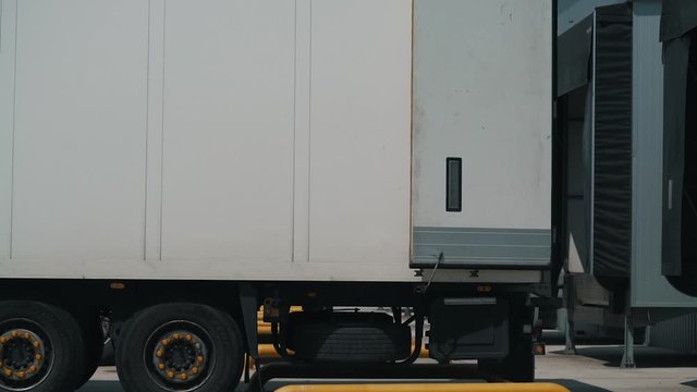 trucks dock with a logistics center