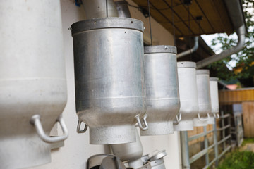 milk buckets outside German farm for cows