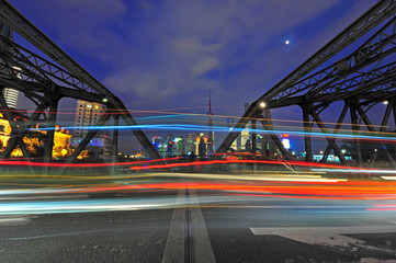 Fototapeta na wymiar Night traffic lights inside of the Garden Bridge of shanghai china.