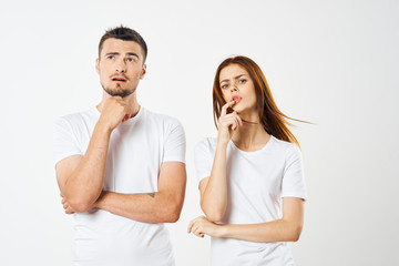 young couple in t-shirts chatting