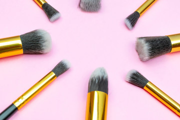 Makeup products. Cosmetic drawing brushes for powder with copy s