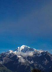 Fototapeta na wymiar Beautiful Shot of a Snowy Mountain With Clear Blue Sky