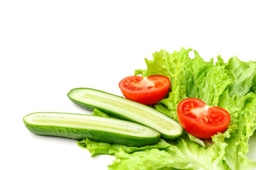 A set of ingredients for green salad on a white background