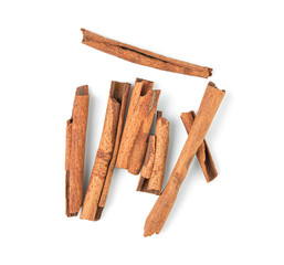 Cinnamon sticks isolated on white background. Top view