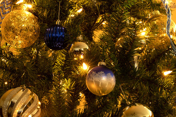 Close-up of decorations on christmas tree during christmas time at home