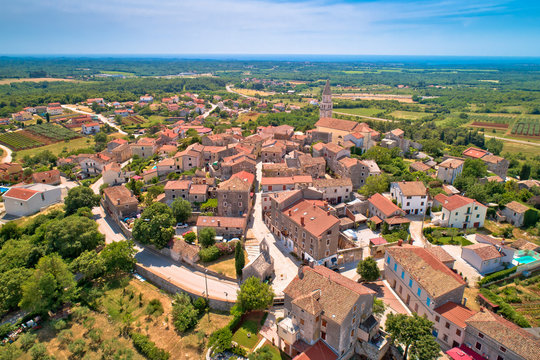 Istria. Town of Visnjan on green istrian hill aerial view