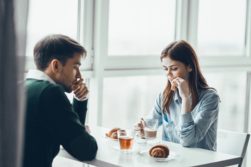young couple in cafe
