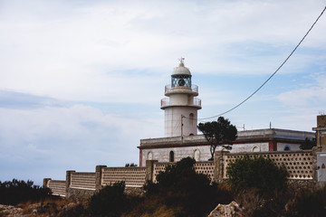 Beautiful super wide-angle aerial view of Xabia, Javea, Marina Alta with harbor and skyline, mountains, beach and city, seen from Cabo de San Antonio viewpoint, province of Alicante, Valencia, Spain