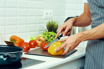 woman cutting vegetables in the kitchen