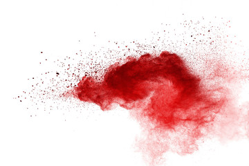 Red powder explosion on white background. Colored cloud. Colorful dust explode. Paint Holi.