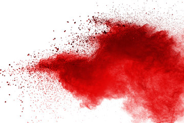 Red powder explosion on white background. Colored cloud. Colorful dust explode. Paint Holi.