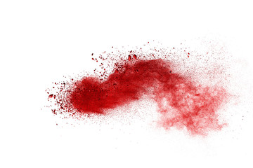 Red powder explosion on white background. Colored cloud. Colorful dust explode. Paint Holi.