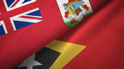 Fototapeta na wymiar Bermuda and Timor-Leste East Timor two flags textile cloth, fabric texture