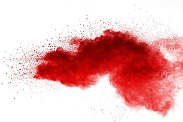 Red powder explosion on white background. Colored cloud. Colorful dust explode. Paint Holi.