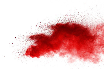 Red powder explosion on white background. Colored cloud. Colorful dust explode. Paint Holi.