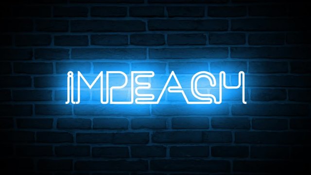 A neon sign on a brick wall that reads: IMPEACH