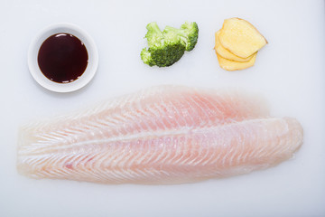 Fish fillets on a white background