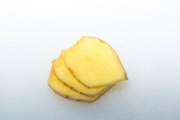 Ginger slices on a white background