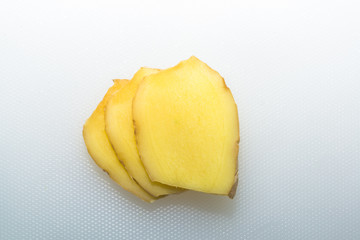 Ginger slices on a white background