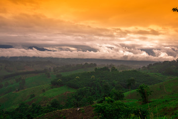 Blurred abstract background of high angle scenery, overlooking mountains, colorful skies, fresh air while traveling