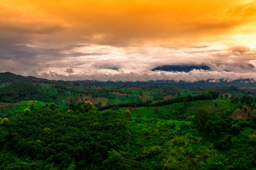 Blurred abstract background of high angle scenery, overlooking mountains, colorful skies, fresh air while traveling