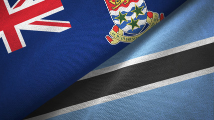 Cayman Islands and Botswana two flags textile cloth, fabric texture