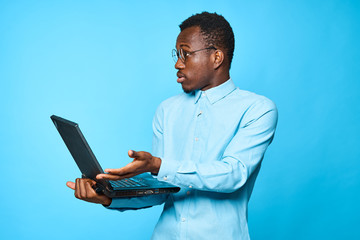 young man with laptop