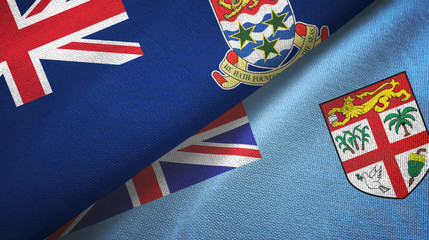 Cayman Islands and Fiji two flags textile cloth, fabric texture