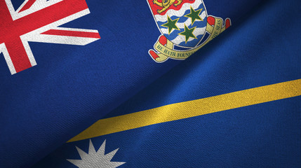 Cayman Islands and Nauru two flags textile cloth, fabric texture