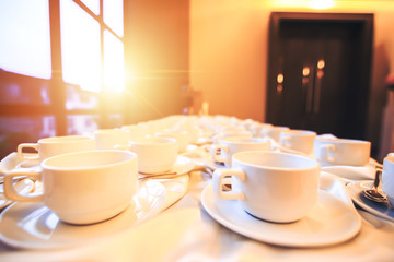 Cup of coffee are on the table in the hotel.