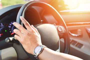 hand wear a watch and drive a car